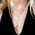 with our diamond carried pendant necklace, bezel bar choker, tennis choker, and trios station necklace <span class='visuallyhidden'>Call, text 323-404-2959 for shopping help.</span>